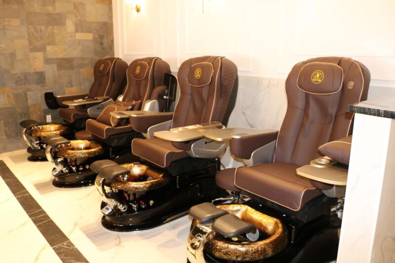 Pedicure lounge with plush leather chairs at NailVibe Cool Springs