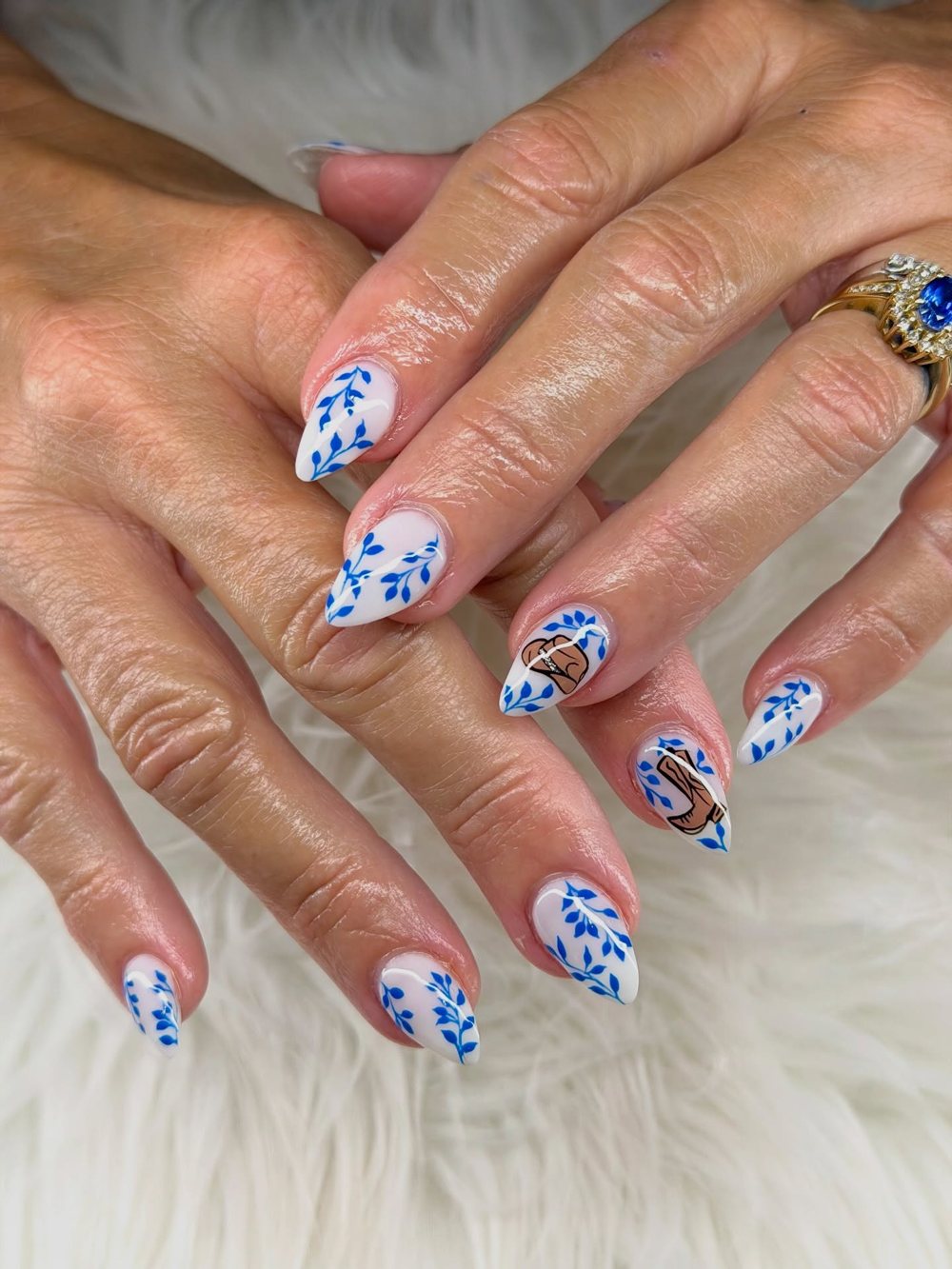 Blue and white floral almond nails