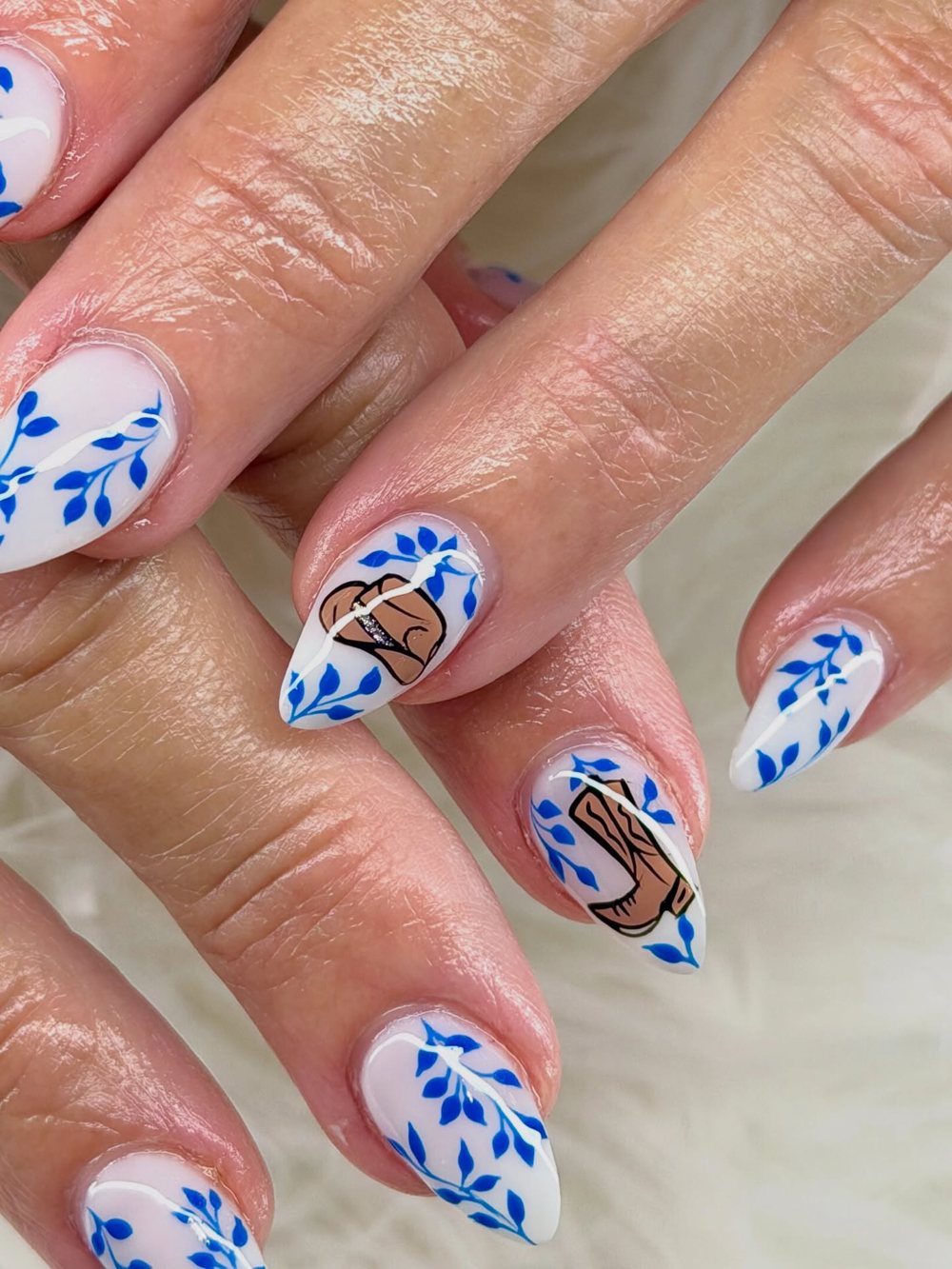 Blue botanical leaf nail art